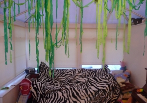 Crepe paper vines and my Dad's old zebra blanket (I knew we kept it for a reason)